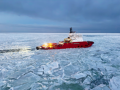an icebreaking offshore support vessel or tug, built to operate in polar or sub‑arctic conditions