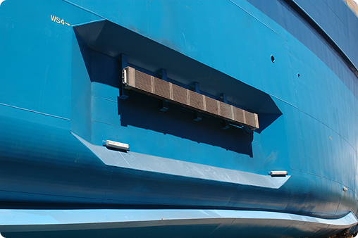 Fernstrum® GRIDCOOLER® Keel Cooler recessed mount on a ship with a blue hull