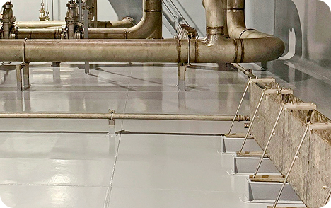 an interior photo of a ship containing several OMEGA Laser Plates